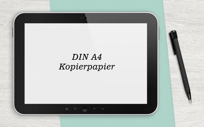 Ein Tablet liegt auf einem mintgrünen Papier. Auf dem Tablet steht in schwarzer Schrift vor weißem Hintergrund das Wort DIN A4 Kopierpapier.